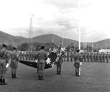 HistPOM-53-1975.jpg - Lowering the Australian flag for the last time at Papua New Guinea Independence Day ceremonies, 15 September 1975. Gough and Margaret Whitlam were among the dignitaries who attended the celebrations. (source: National Archives of Australia; http://primeministers.naa.gov.au/Images/A6180_22-9-75-20_tcm13-21479.jpg; accessed: 3.2.2013)