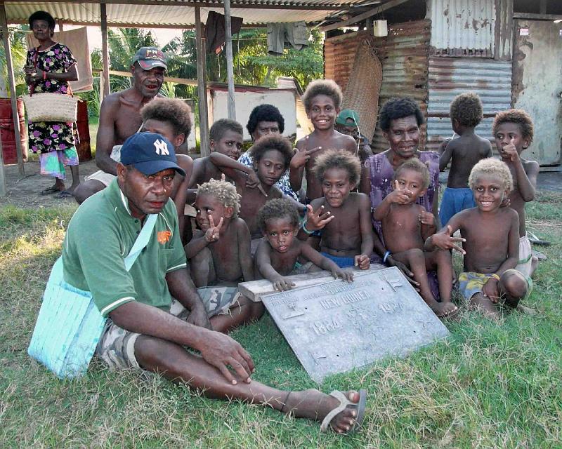 PNG8-30-Seib-2012.jpg - Matupit villagers taking care of the German Memorial Plaque 1884-1984 (Photo by Roland Seib)